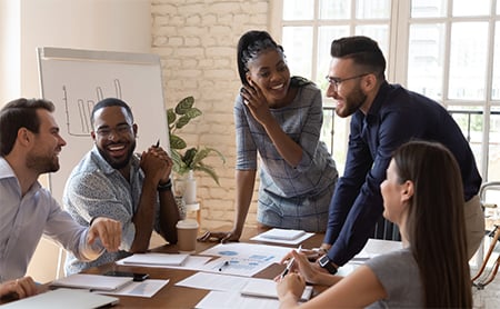 A diverse group of coworkers work collaboratively