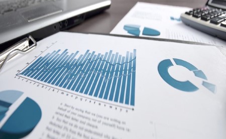 financial-graphs-documents-on-desk_1200x740.jpg